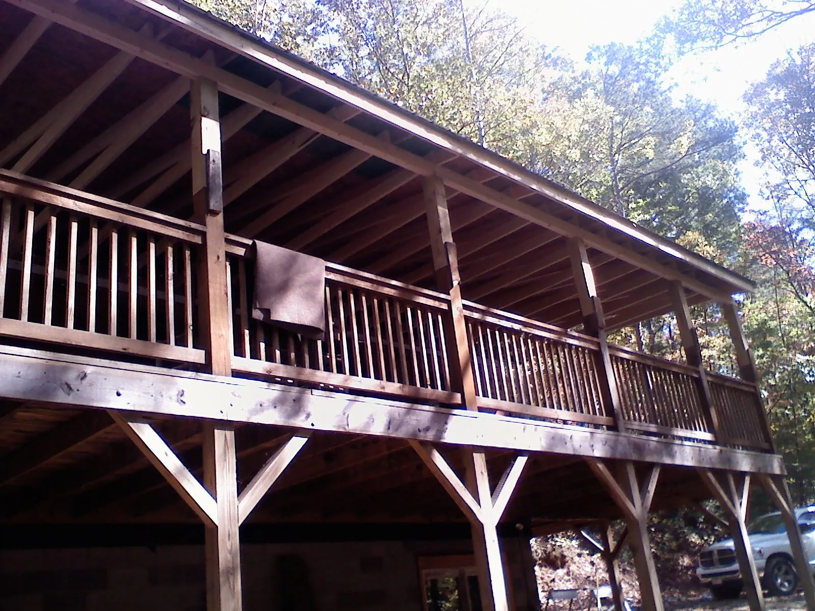 Timber framing under a new elevated porch and deck — Roof Leak Repair in Danbury by Roofing Brothers
